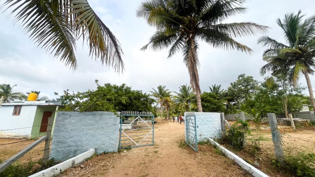 Coconut Garden — Grand entrance gate and perimeter compound wall in Bidadi